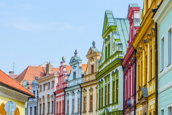view of colorful facades of old style houses situated next to the velke namesti square in historical part of czech city hradec kralove